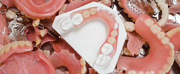 Что такое съемные зубные протезы?